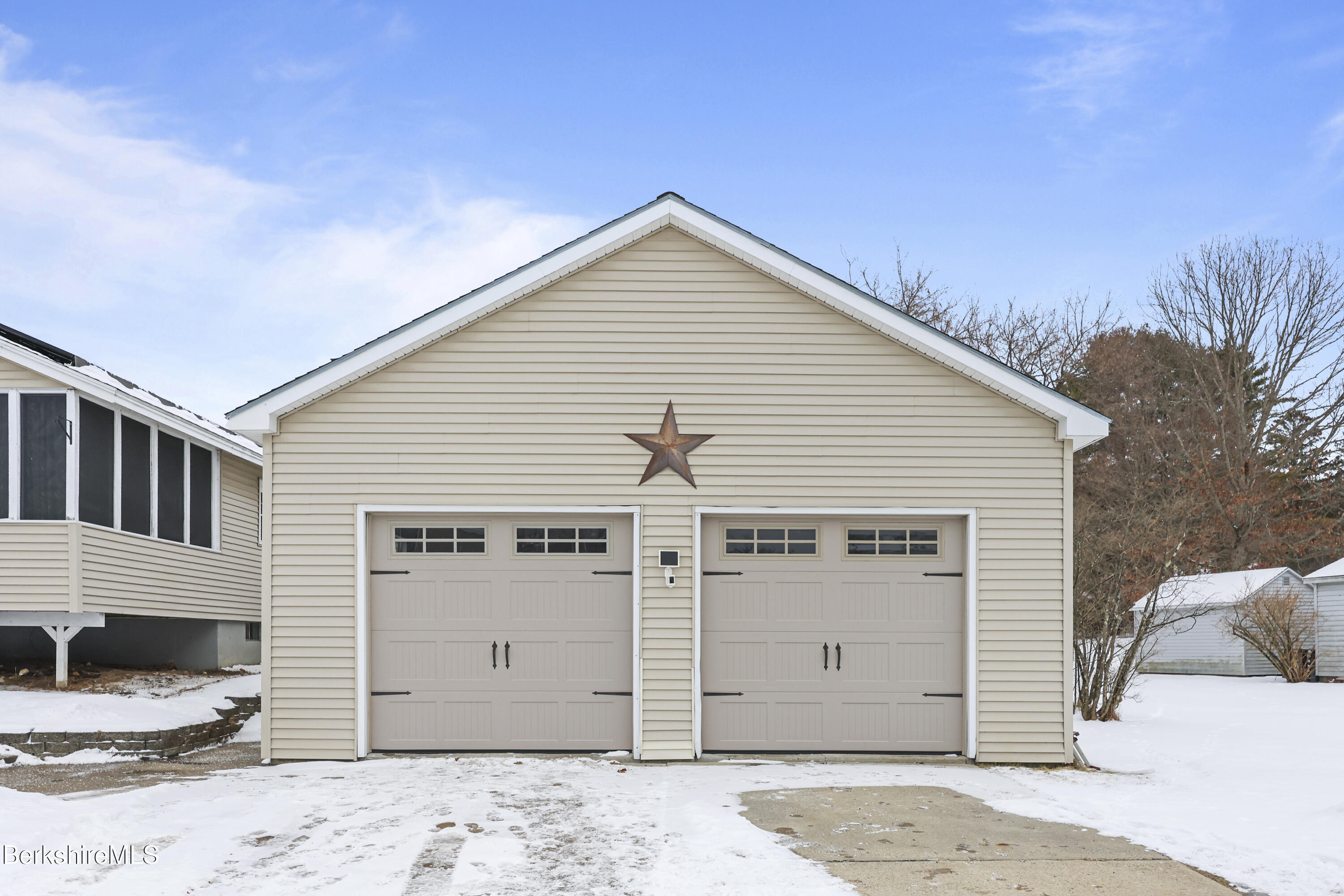 290 East Center Street Lee, MA 01238 - Photo 42 of 47 a view of a house with a garage