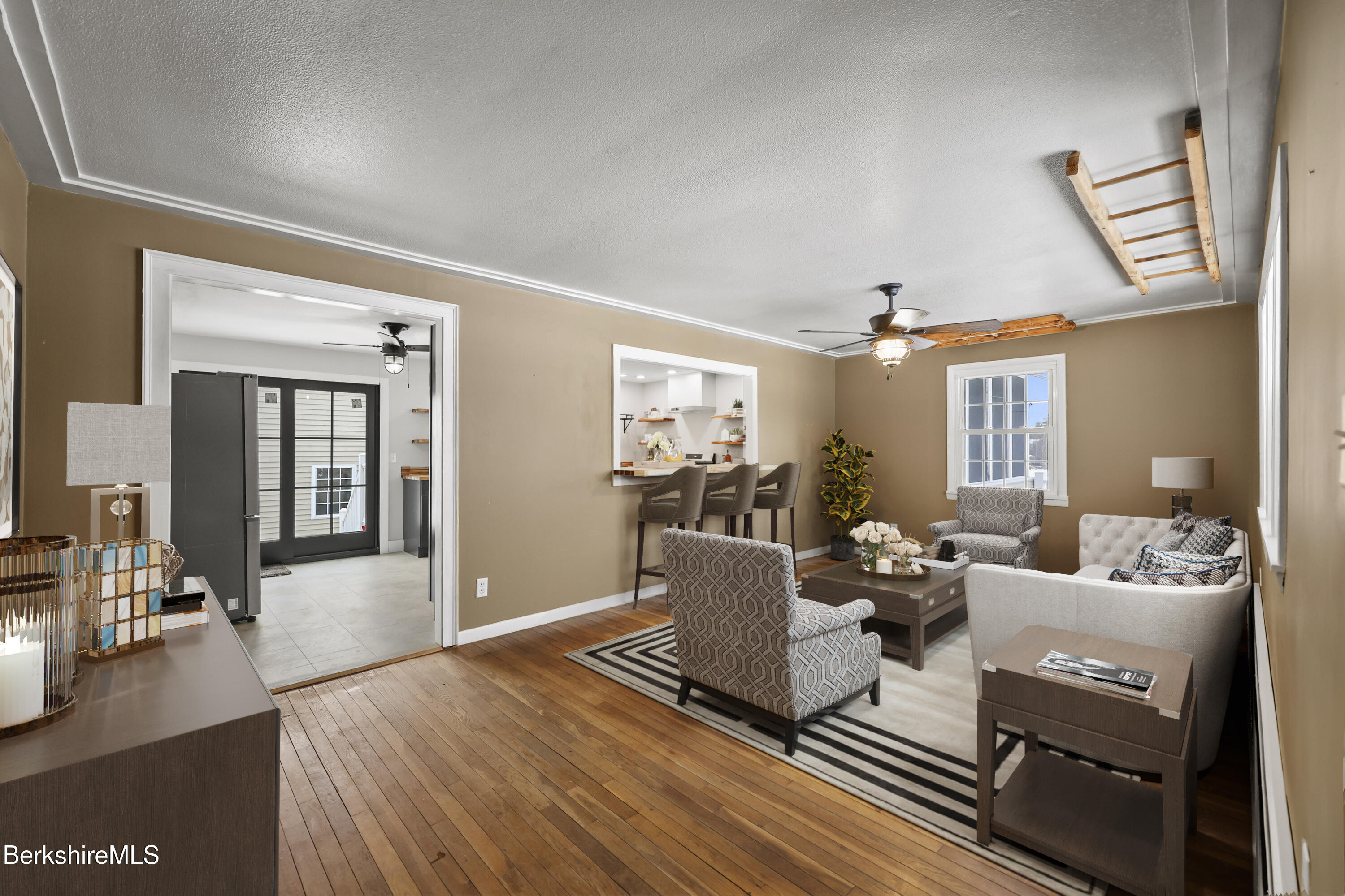 290 East Center Street Lee, MA 01238 - Photo 7 of 47 a living room with furniture and wooden floor
