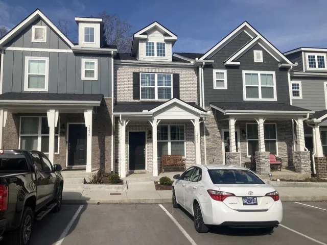 a car parked in front of a house