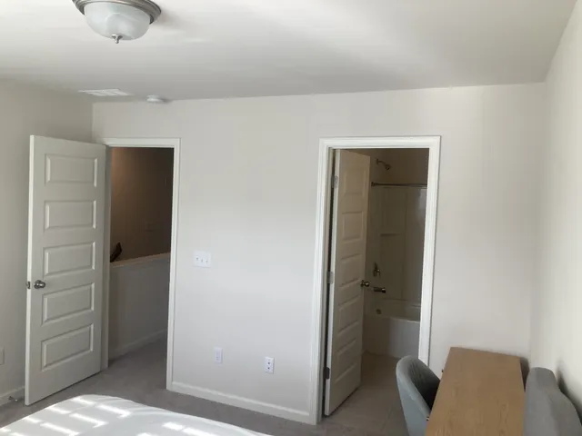a view of room with walk in closet