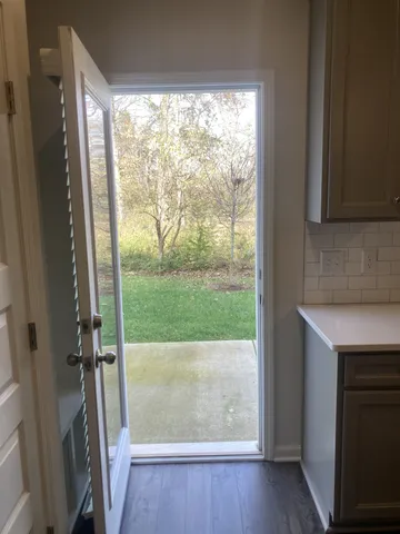 a view of front door and deck
