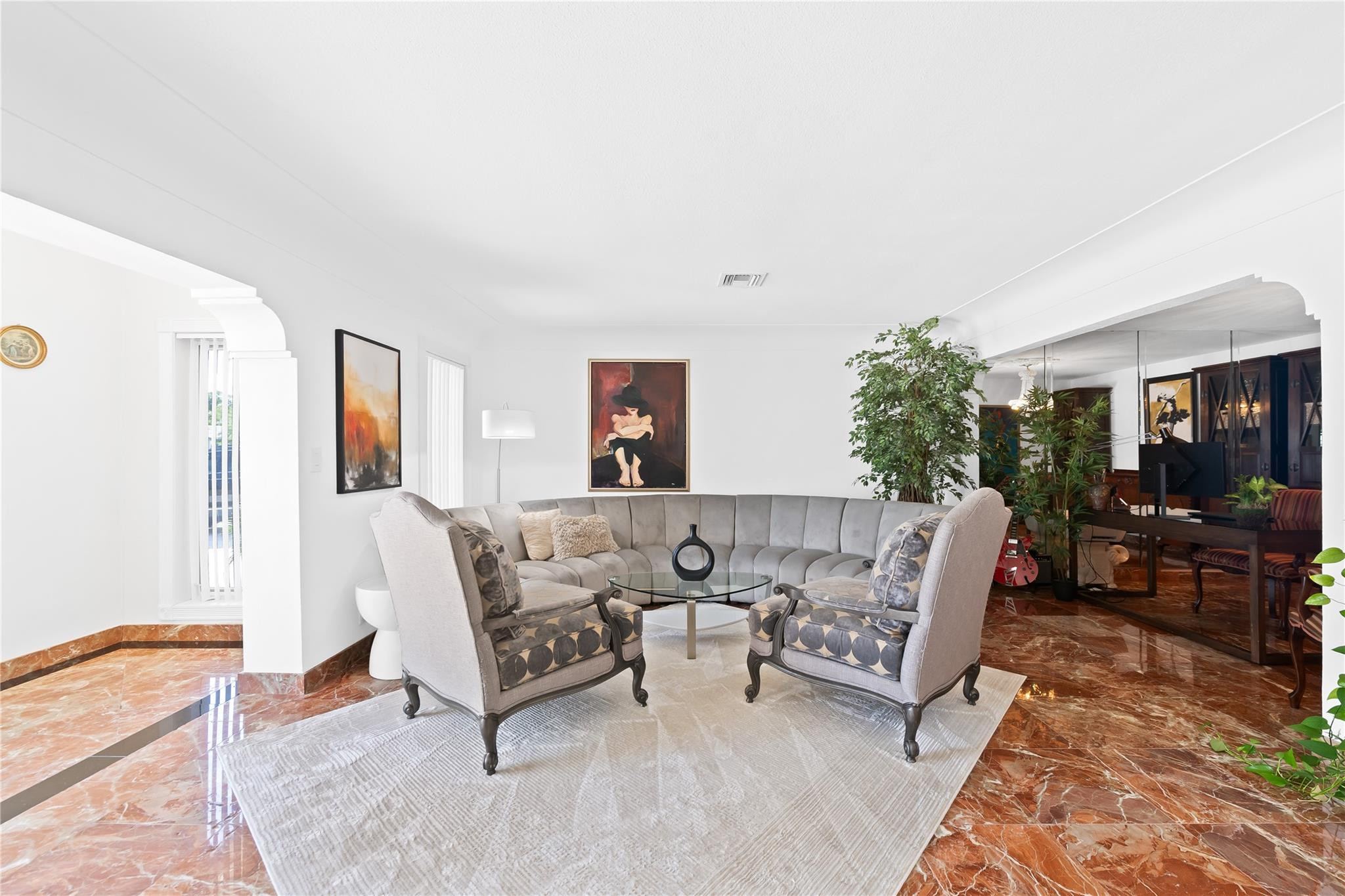 3301 Northeast 27th Avenue Lighthouse Point, FL 33064 - Photo 13 of 41 a living room with furniture and a rug