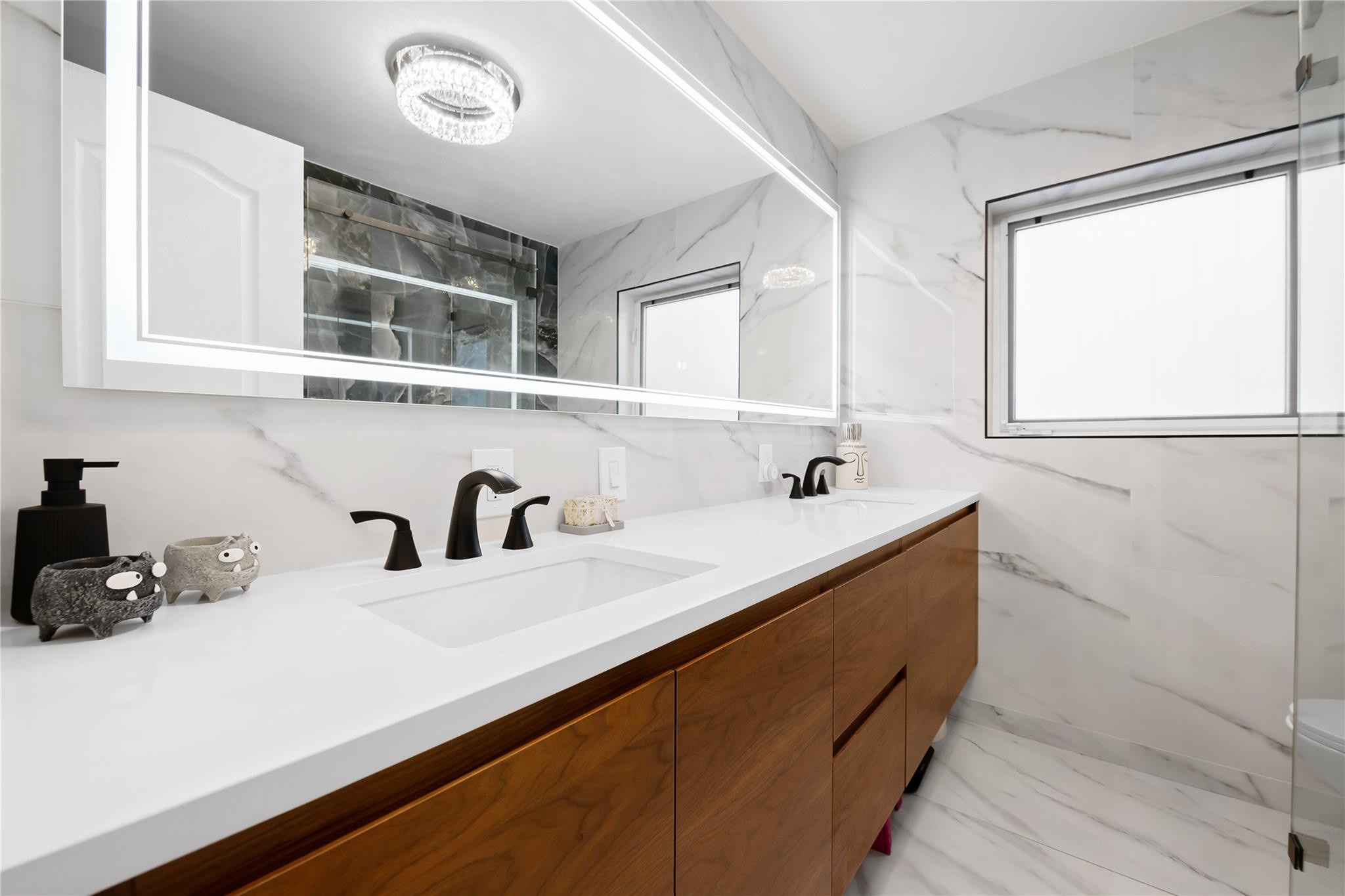 3301 Northeast 27th Avenue Lighthouse Point, FL 33064 - Photo 16 of 41 a kitchen with a sink and a window