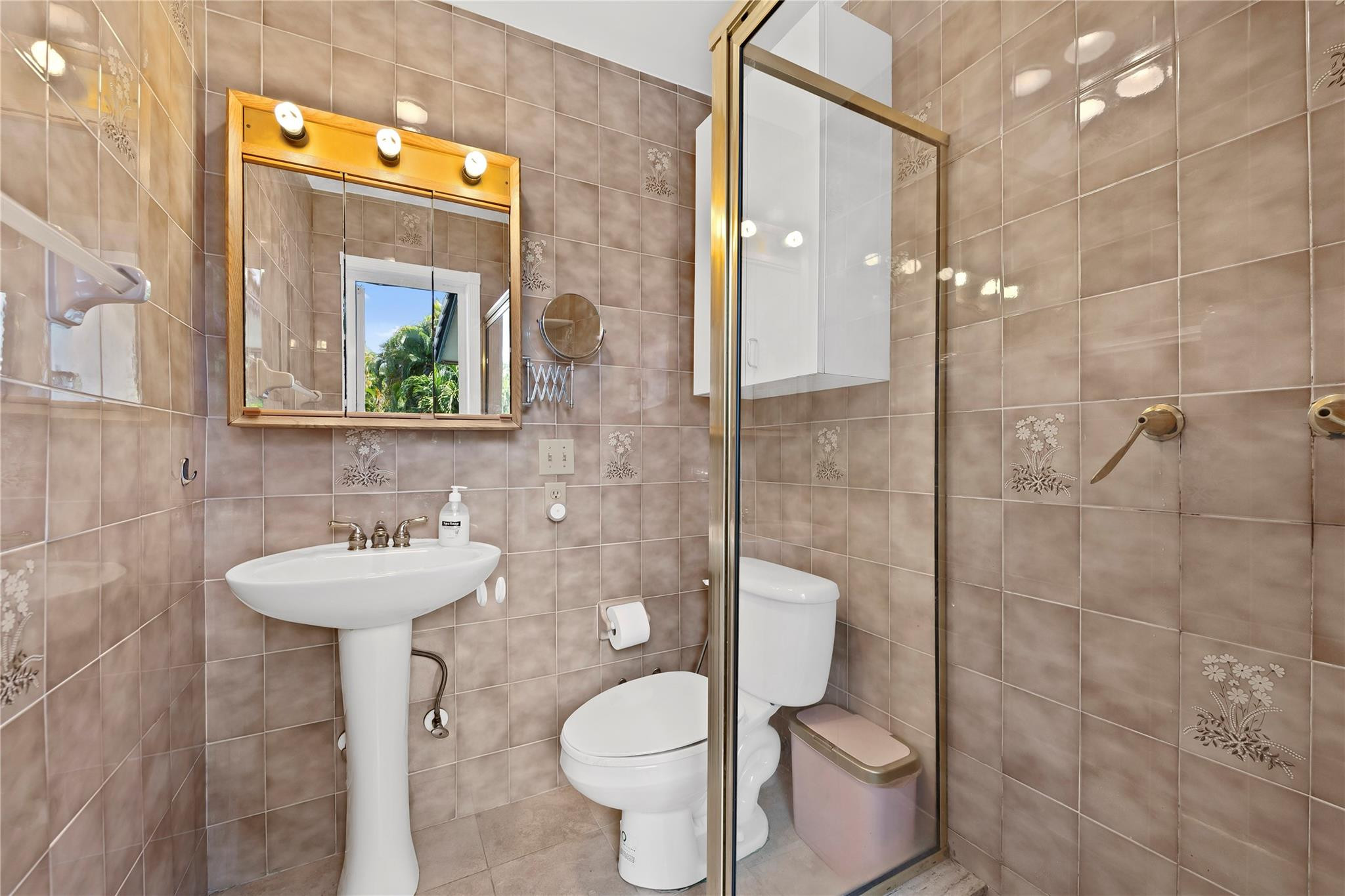 3301 Northeast 27th Avenue Lighthouse Point, FL 33064 - Photo 31 of 41 a bathroom with a sink toilet and shower