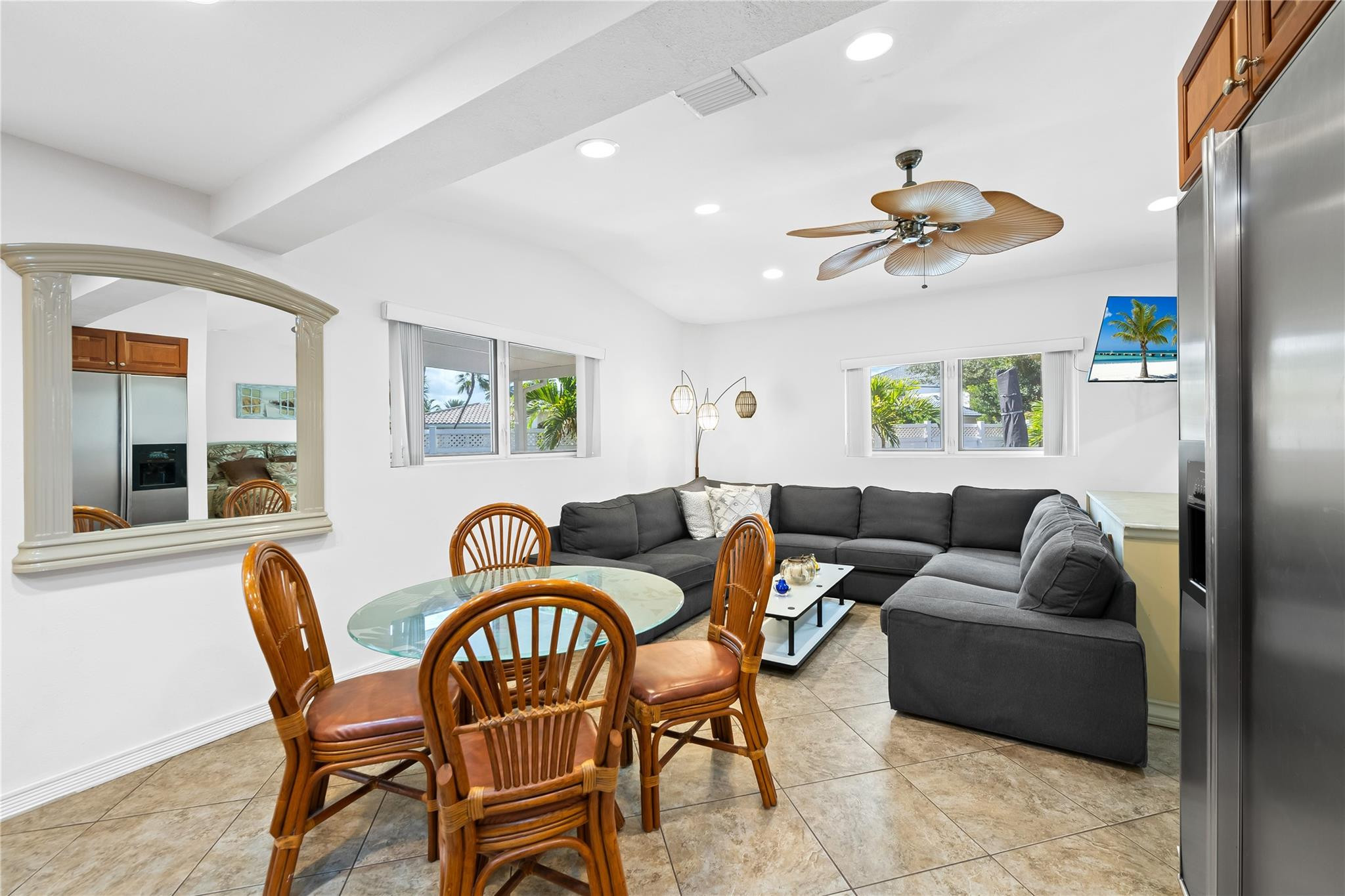 3301 Northeast 27th Avenue Lighthouse Point, FL 33064 - Photo 40 of 41 a living room with furniture and a large window