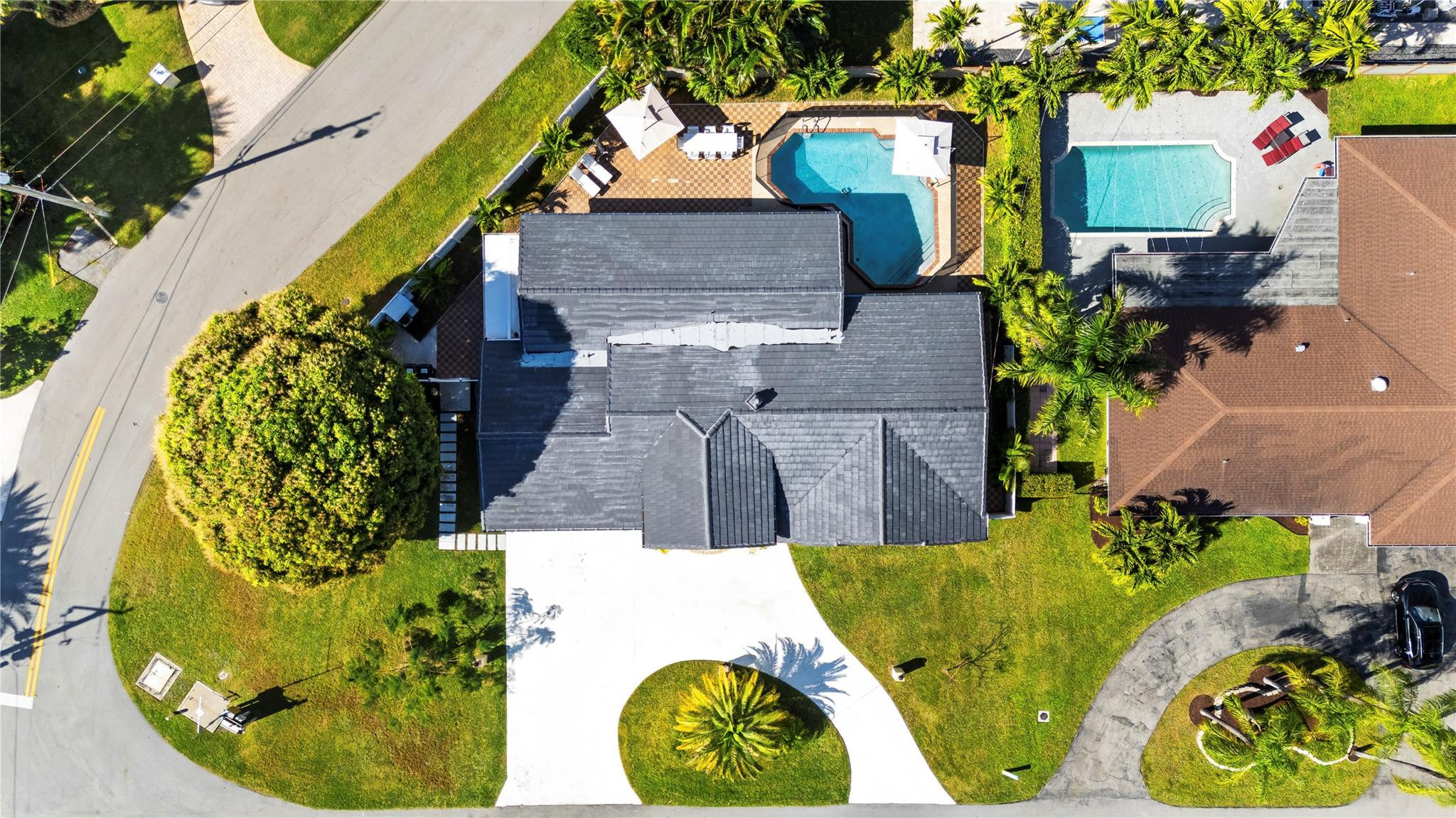 3301 Northeast 27th Avenue Lighthouse Point, FL 33064 - Photo 5 of 41 an aerial view of a house with a swimming pool