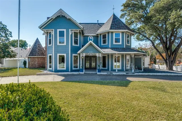 a front view of a house with swimming pool
