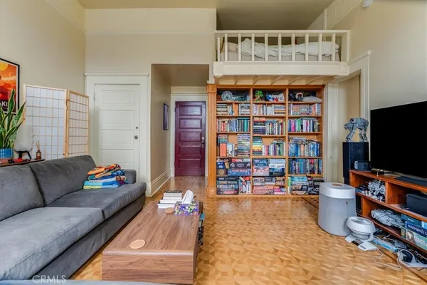 a kitchen with stainless steel appliances granite countertop a refrigerator and a stove