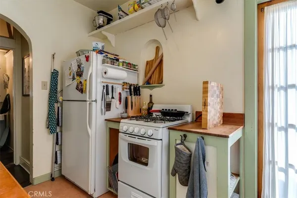 a view of a entryway door and dining room