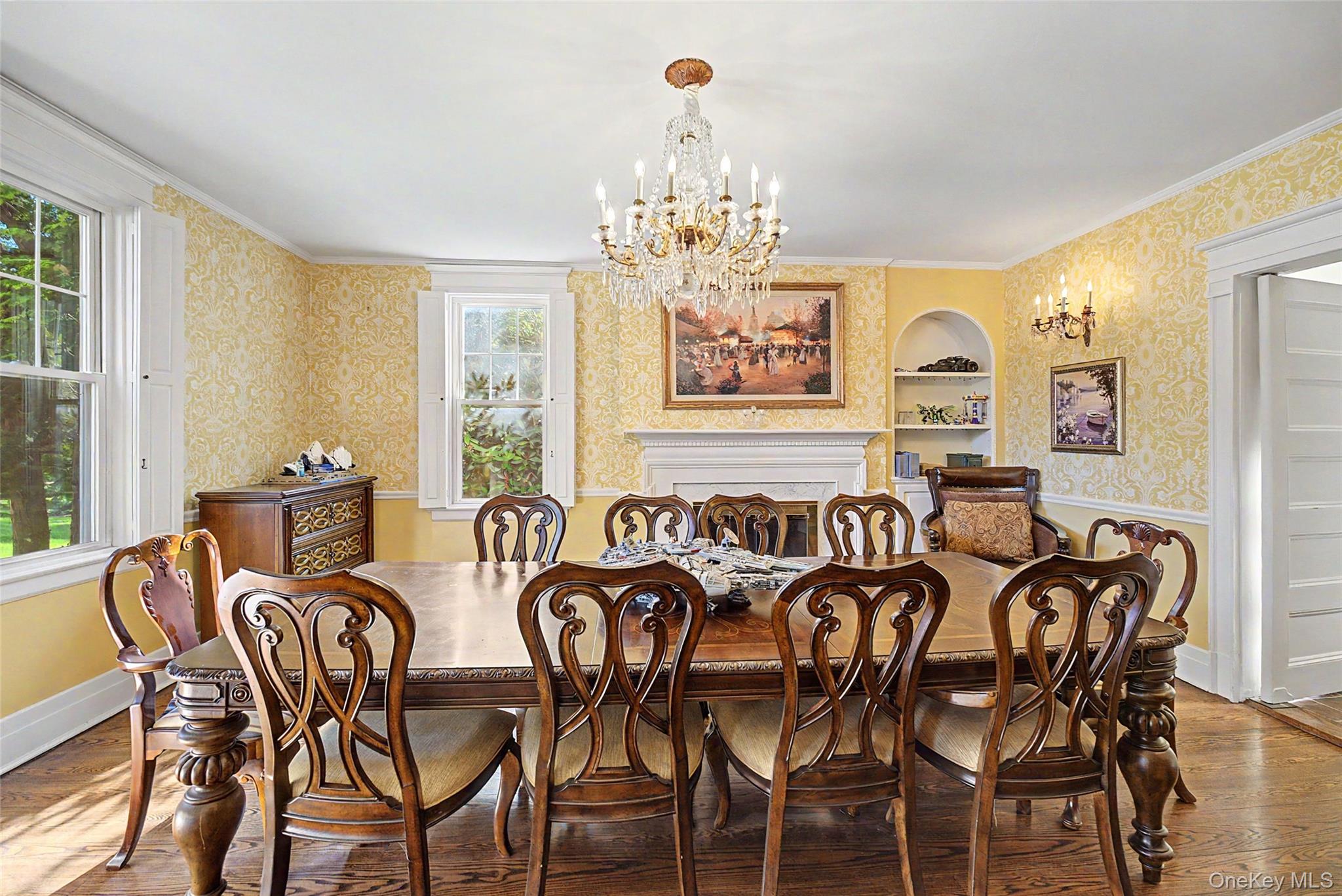 23 Townsend Road Glen Cove, NY 11542 - Photo 13 of 23 a view of a dining room with furniture a chandelier and large windows