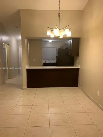 a view of kitchen with microwave