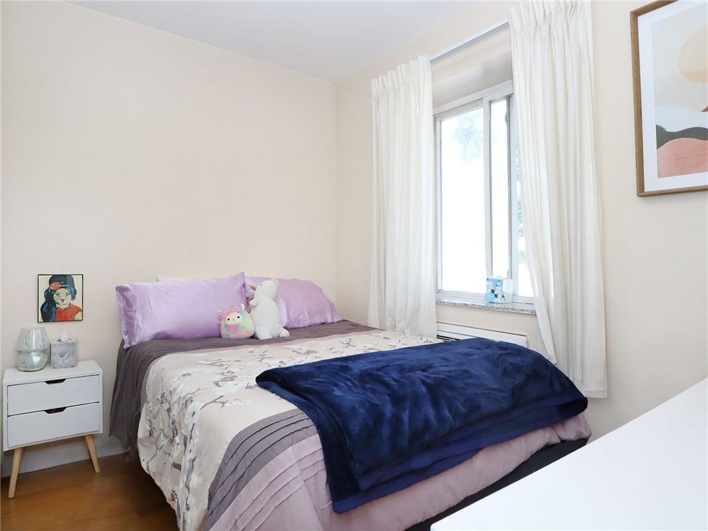 643 Morgan Avenue Brooklyn, NY 11222 - Photo 25 of 50 a bedroom with a bed and window