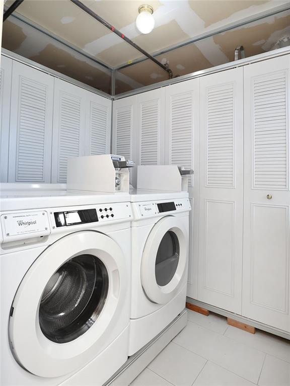 643 Morgan Avenue Brooklyn, NY 11222 - Photo 48 of 50 a utility room with dryer and washer