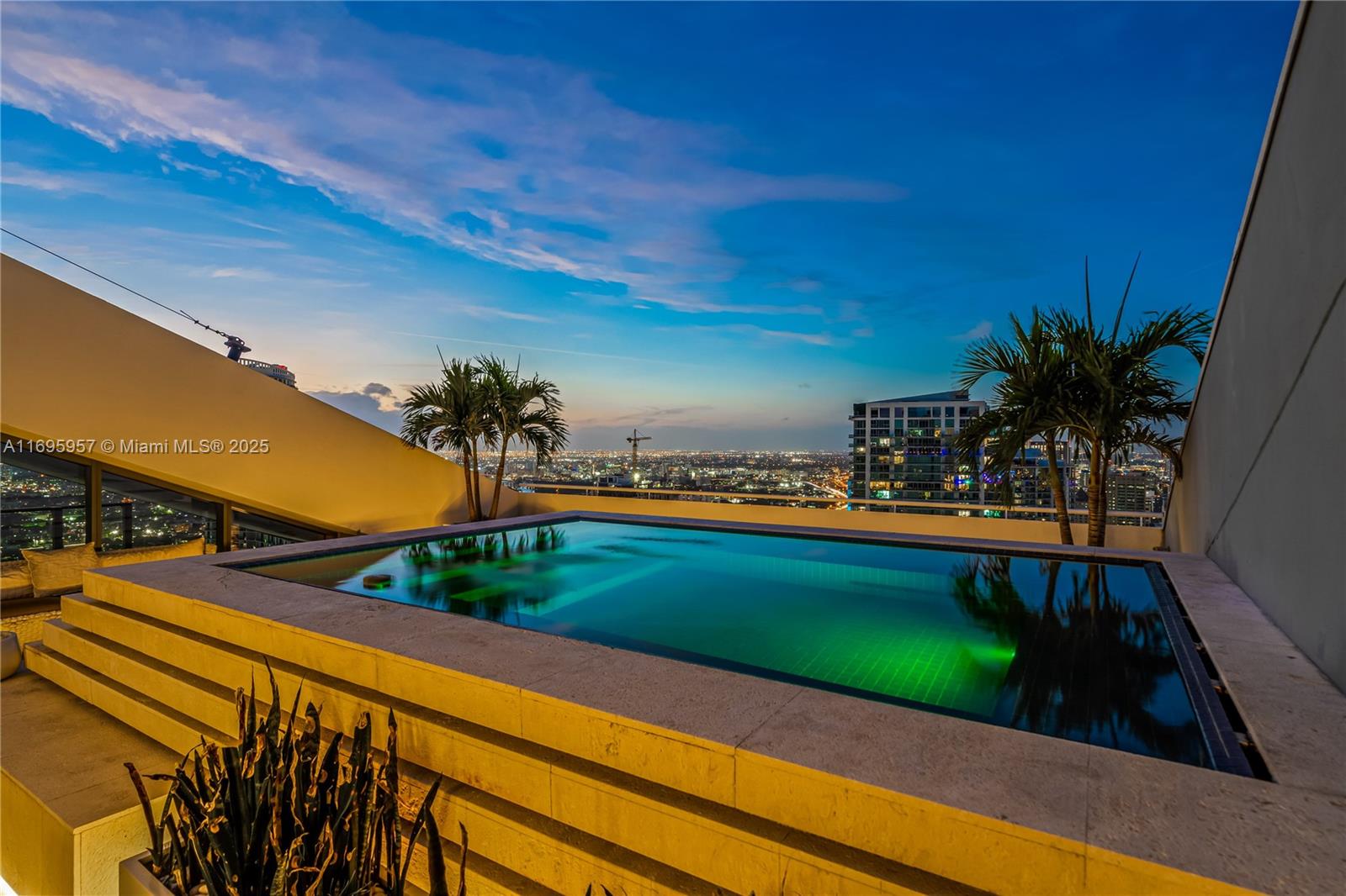 88 Southwest 7th Street, Unit 4203 Miami, FL 33130 - Photo 3 of 96 a view of a swimming pool with a yard