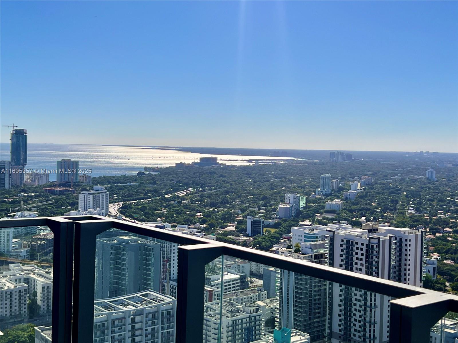 88 Southwest 7th Street, Unit 4203 Miami, FL 33130 - Photo 46 of 96 a view of a city from a balcony