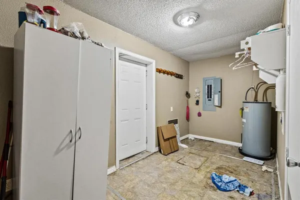 a bathroom that has a glass shower door