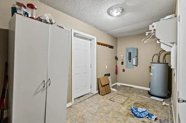a bathroom that has a glass shower door
