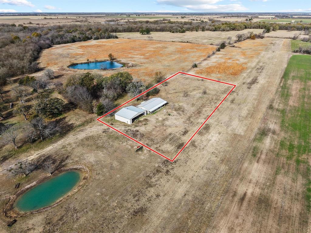 1841 County Road Honey Grove, TX 75446 - Photo 31 of 32 an aerial view of a tennis court