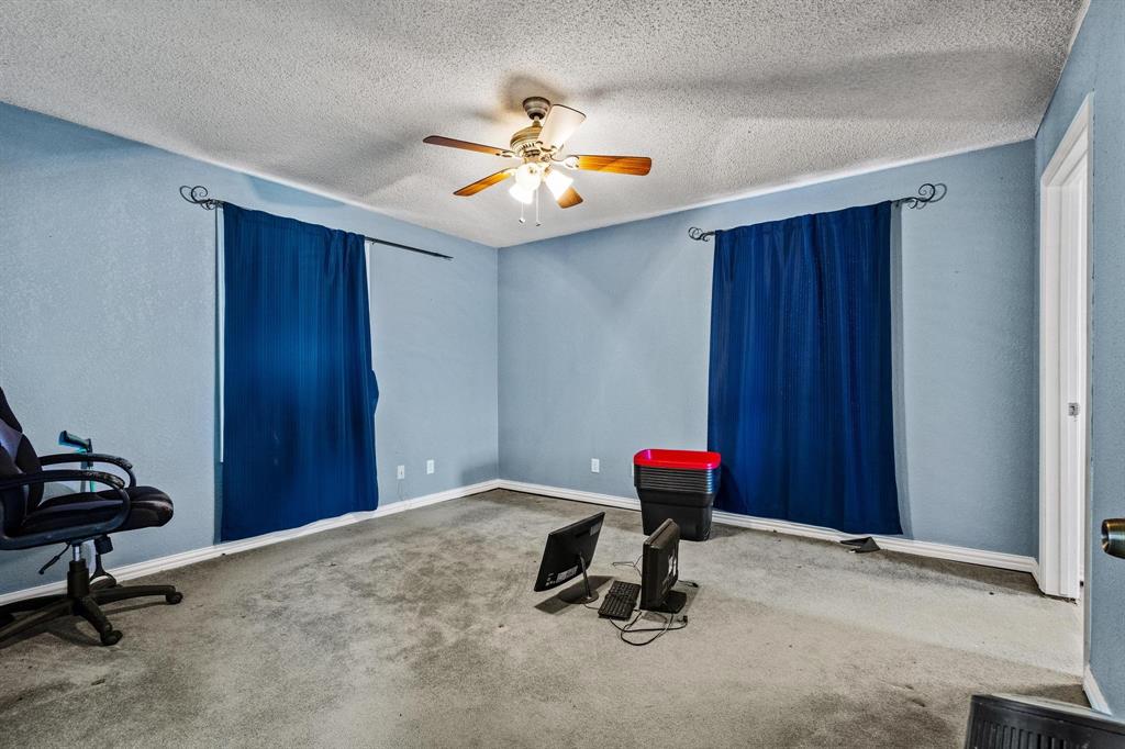 1841 County Road Honey Grove, TX 75446 - Photo 8 of 32 a view of a room with gym equipment