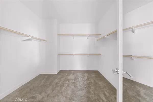 a view of an empty walk in closet