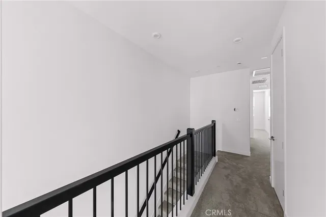 a view of hallway with stairs