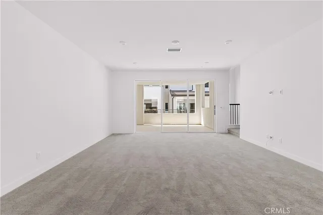a spacious bathroom with a granite countertop sink and a shower