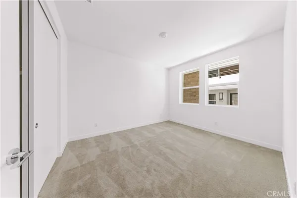 a view of a balcony with chairs