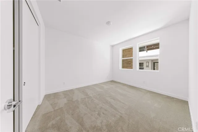 a view of a balcony with chairs