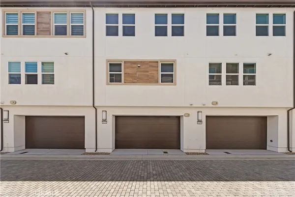 a view of a porch with chairs and chandelier