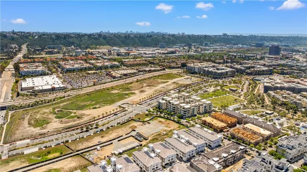 an aerial view of residential building with parking space