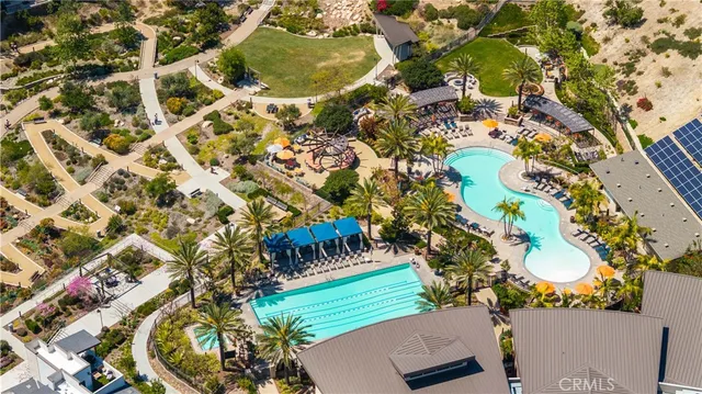 aerial view of a house with a large tree
