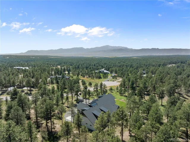 a front view of a house with swimming pool