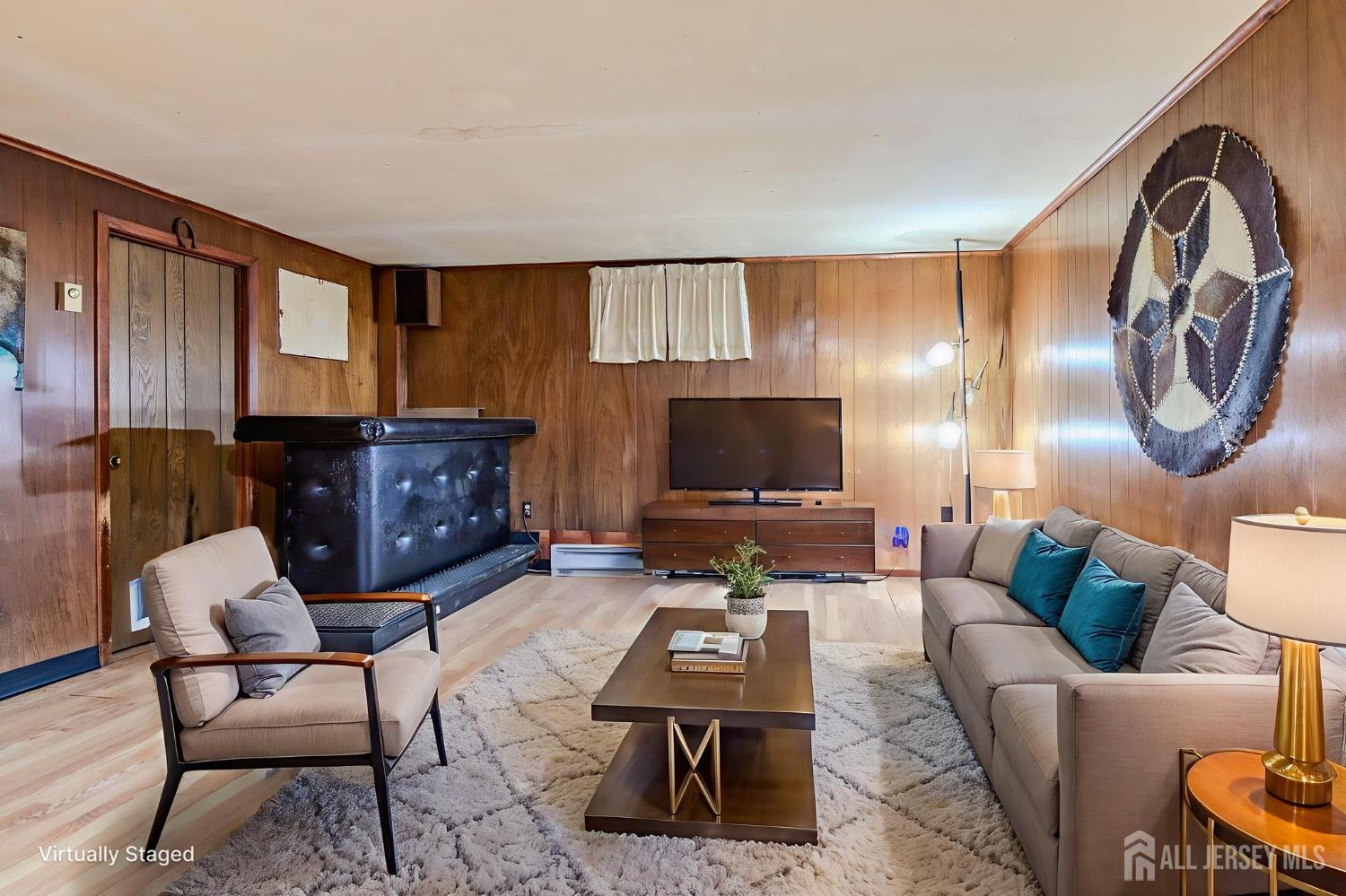347 Lincoln Boulevard Middlesex, NJ 08846 - Photo 13 of 25 a living room with furniture and a flat screen tv