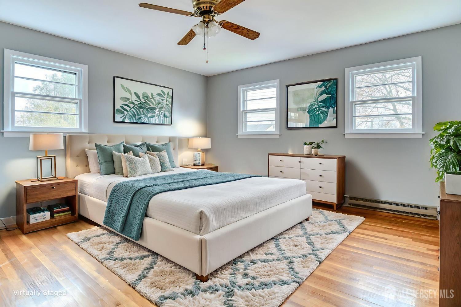 347 Lincoln Boulevard Middlesex, NJ 08846 - Photo 21 of 25 a bedroom with a bed and a window