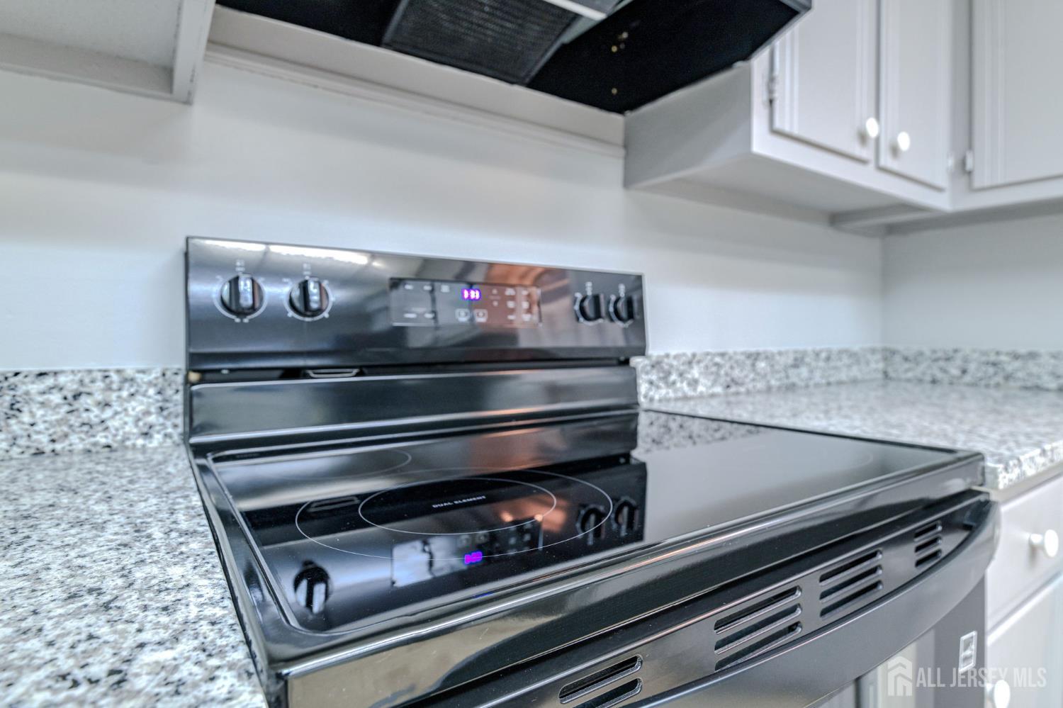 347 Lincoln Boulevard Middlesex, NJ 08846 - Photo 9 of 25 a stove top oven sitting inside of a kitchen