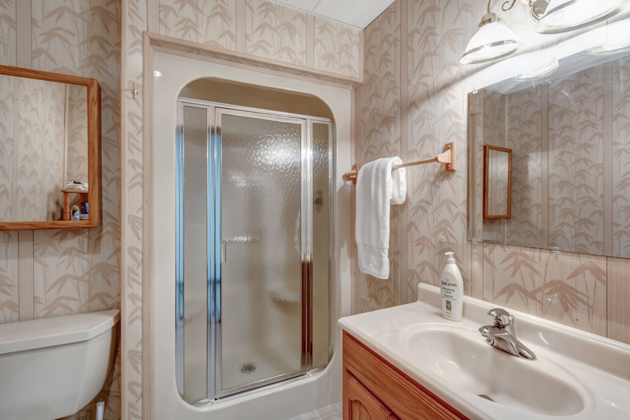 326 Loop Drive Winchester, TN 37398 - Photo 25 of 50 a bathroom with a granite countertop sink toilet and shower