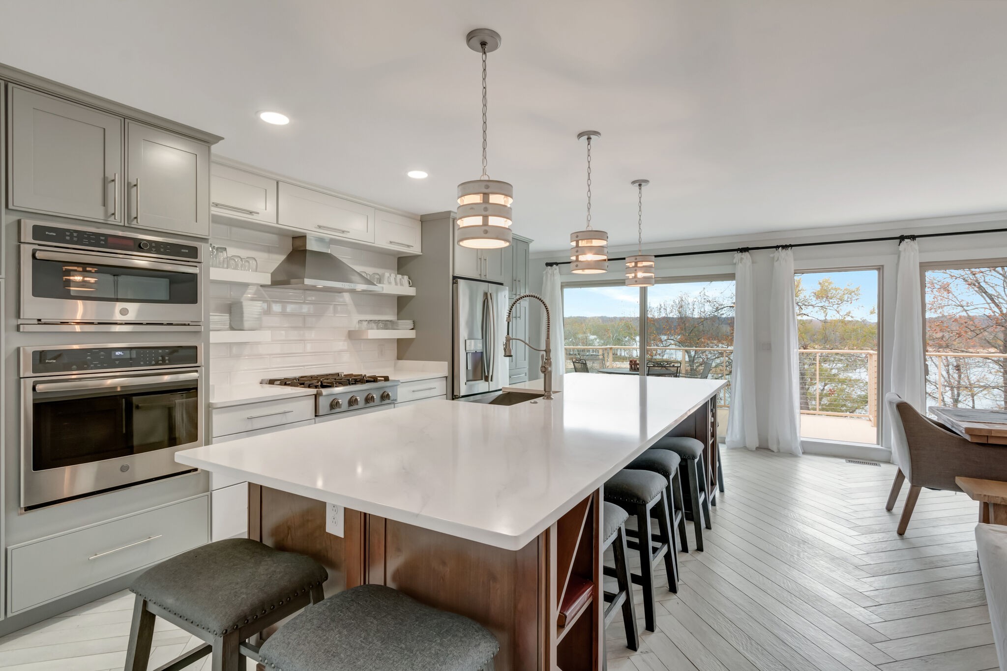 326 Loop Drive Winchester, TN 37398 - Photo 10 of 50 a kitchen with kitchen island a stove a table and chairs in it
