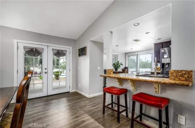 a kitchen with a table and chairs in it
