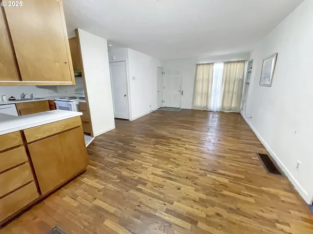 a view of a storage & utility room with a sink