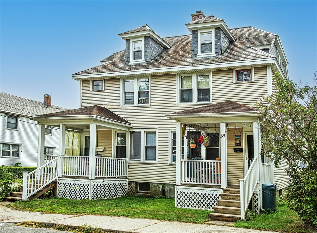 104-106 Everett Street Easthampton, MA 01027 - Photo 1 of 28 a front view of a house with a yard