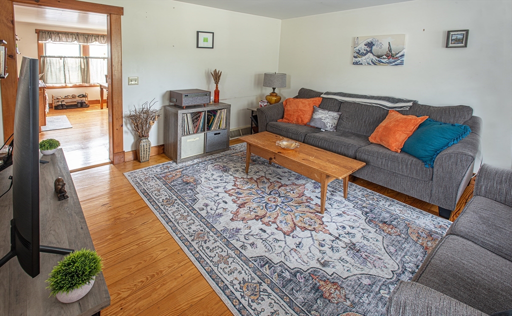 104-106 Everett Street Easthampton, MA 01027 - Photo 12 of 28 a living room with a couch and a rug