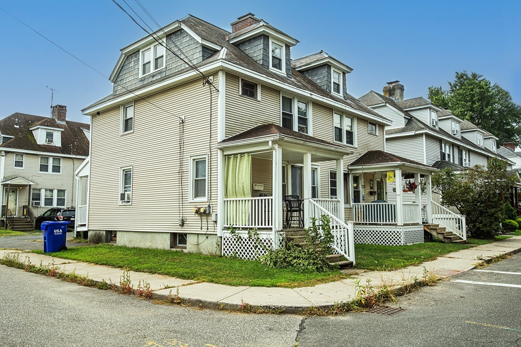 104-106 Everett Street Easthampton, MA 01027 - Photo 2 of 28 a front view of a house with a yard