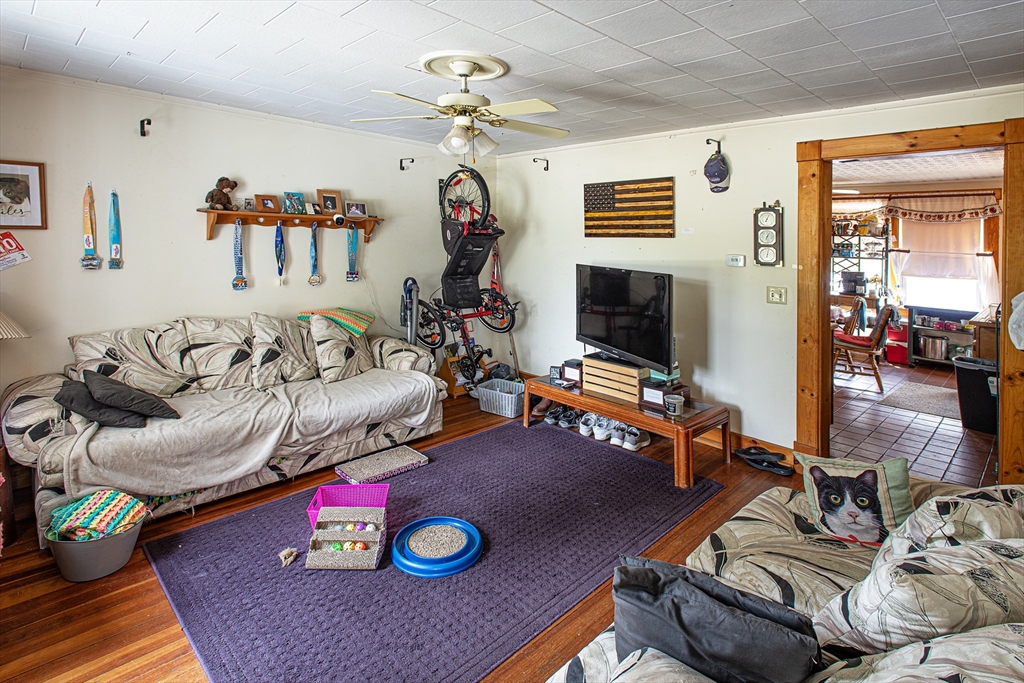 104-106 Everett Street Easthampton, MA 01027 - Photo 24 of 28 a living room with furniture and a flat screen tv