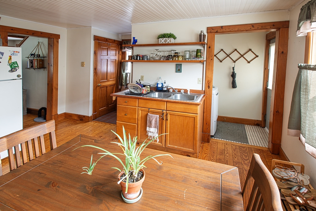 104-106 Everett Street Easthampton, MA 01027 - Photo 7 of 28 a bedroom with a bed and a flat screen tv on the dresser