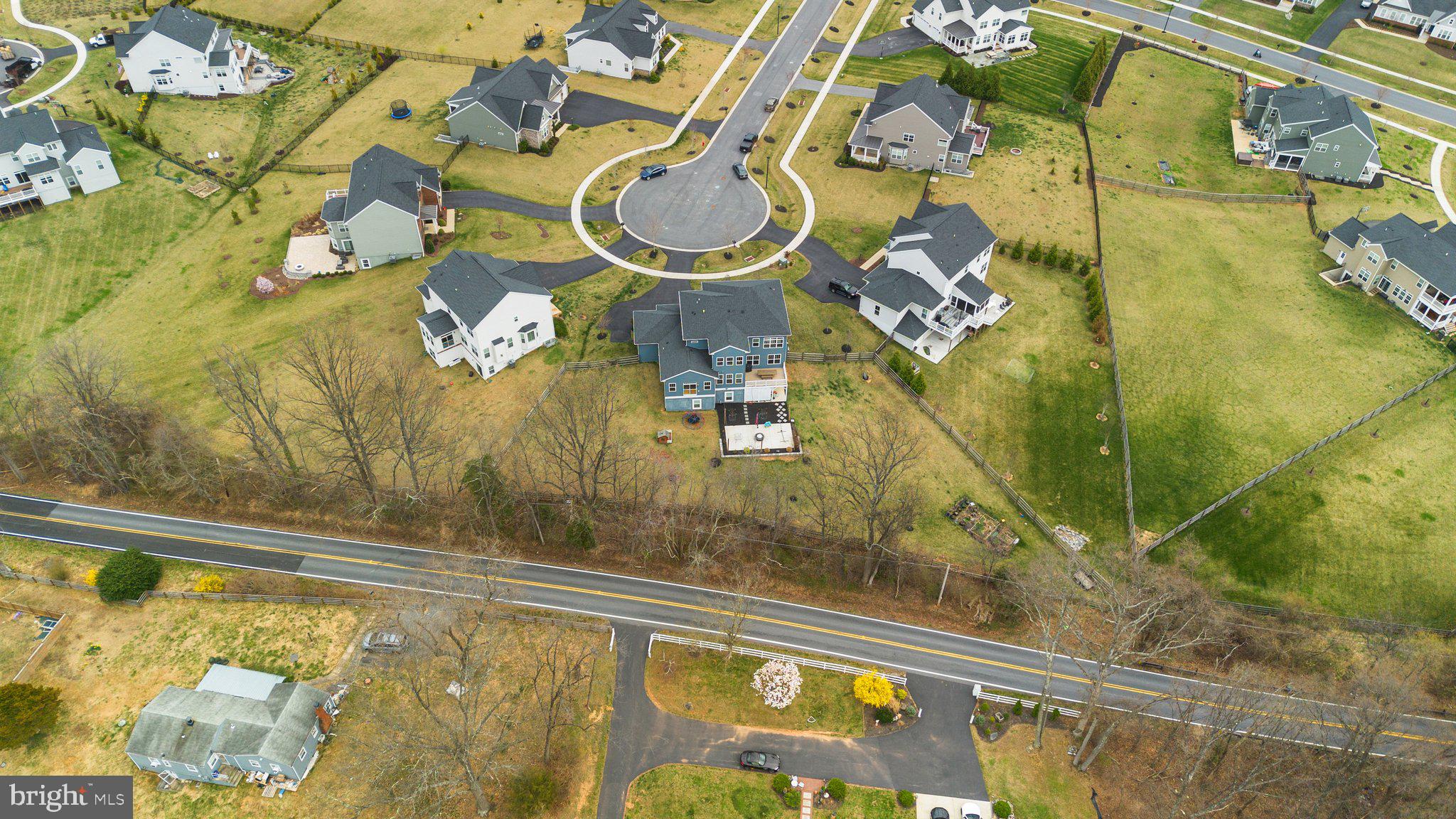 18608 Compher Court Poolesville, MD 20837 - Photo 33 of 40 a bathroom with a sink mirror and vanity