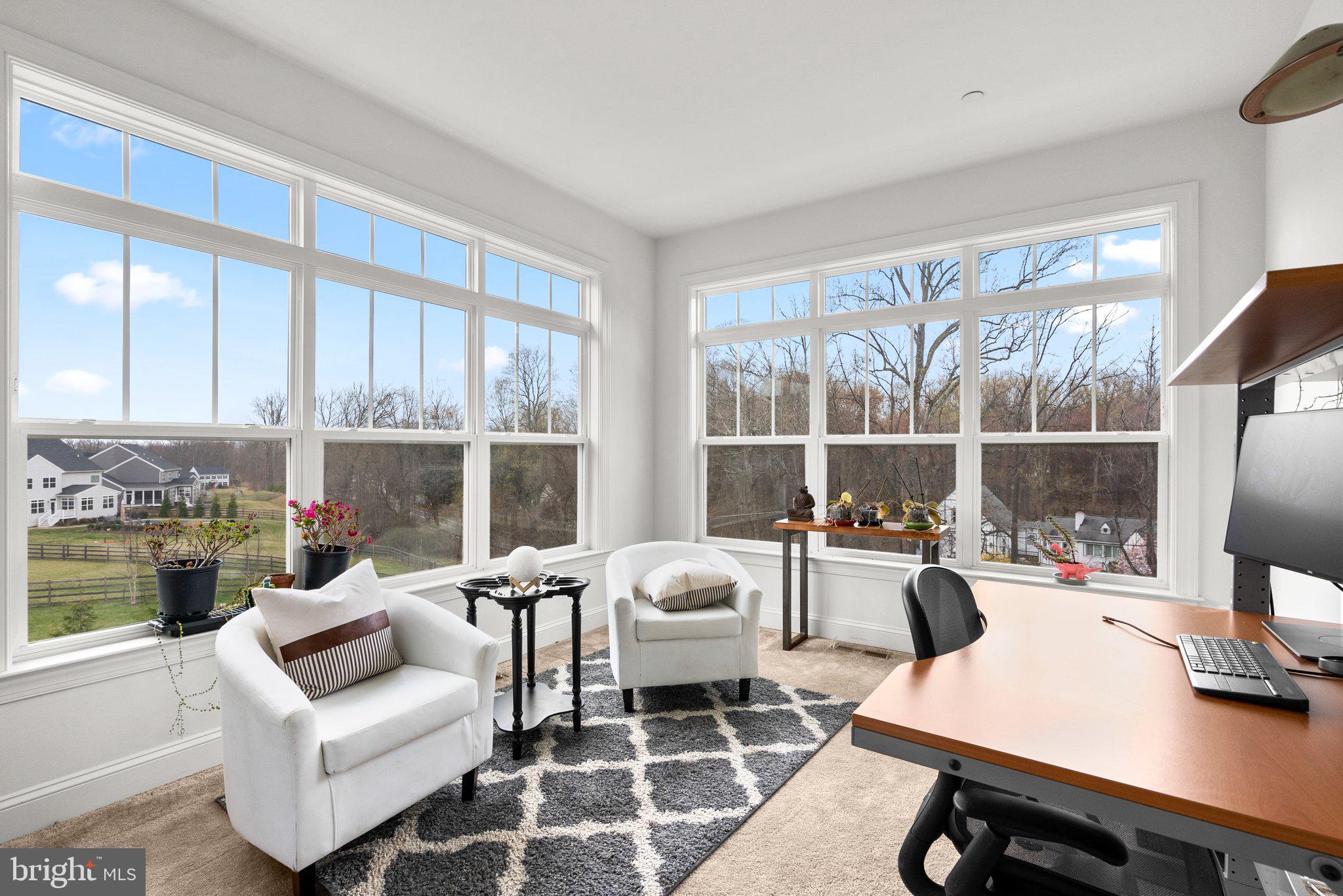 18608 Compher Court Poolesville, MD 20837 - Photo 5 of 40 a living room with furniture and a large window