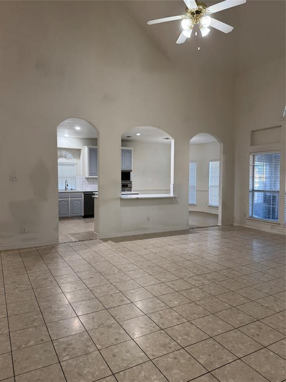 5817 Mulvane Drive Plano, TX 75094 - Photo 12 of 39 a view of empty room with kitchen and sink