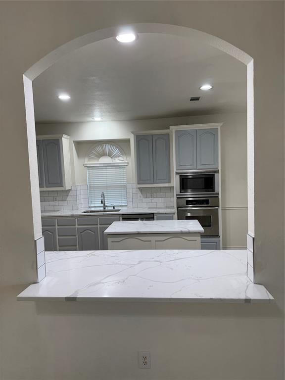 5817 Mulvane Drive Plano, TX 75094 - Photo 15 of 39 a view of kitchen with stainless steel appliances cabinets