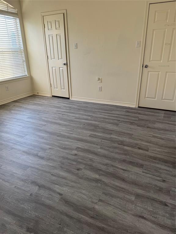 5817 Mulvane Drive Plano, TX 75094 - Photo 33 of 39 a view of empty room with wooden floor and fan