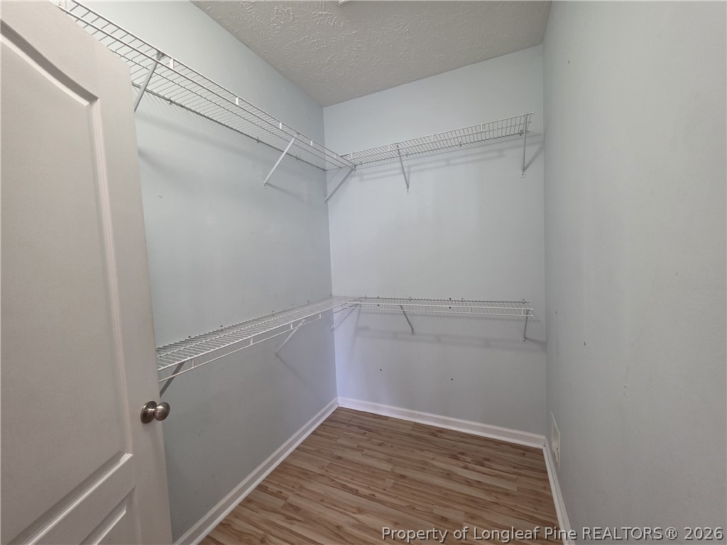 1324 Kershaw Loop, Unit 206 Fayetteville, NC 28314 - Photo 16 of 26 a view of an empty walk in closet